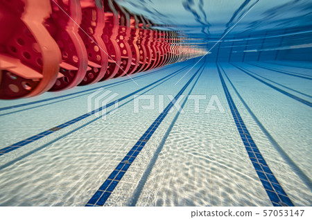 Olympic Swimming pool under water background. 57053147