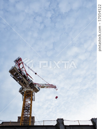 Tower crane at a construction site Tower crane at a construction site 57054522