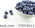 fresh blueberry fruits in a small white bowl 57059011