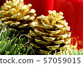 golden pine cone on a christmas decoration with 57059015
