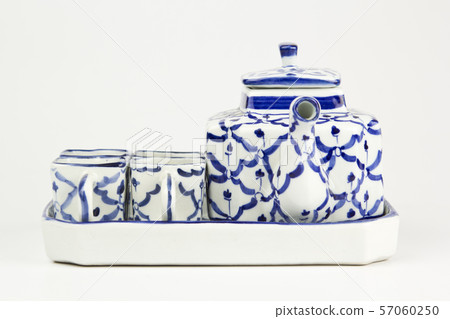 Antique teapot isolated on white background Antique teapot isolated on white background 57060250