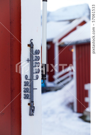 outdoor thermometer on a wooden house outdoor thermometer on a wooden house 57061533