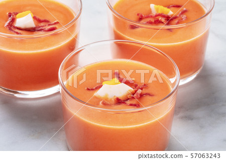 Salmorejo, Spanish cold tomato and bread soup, in glasses 57063243