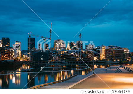 Oslo, Norway. Night View Embankment And Residential Multi-storey House On Sorengkaia Street In Gamle Oslo, Norway. Night View Embankment And Residential Multi-storey House On Sorengkaia Street In Gamle 57064979