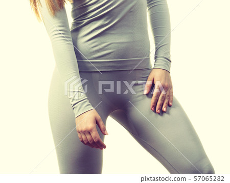 Female hips wearing thermoactive underwear Female hips wearing thermoactive underwear 57065282