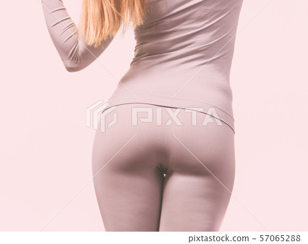Gorgeous lady showing backside. 57065288