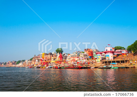 Colorful boats and Ganges river Colorful boats and Ganges river 57066736