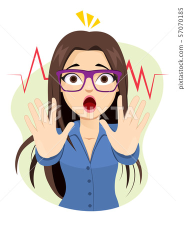 Scared businesswoman arms up making stop hands gesture with mouth open afraid expression Scared businesswoman arms up making stop hands gesture with mouth open afraid expression 57070185