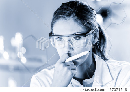 Portrait of a confident female researcher in life science laboratory writing structural chemical Portrait of a confident female researcher in life science laboratory writing structural chemical 57071548