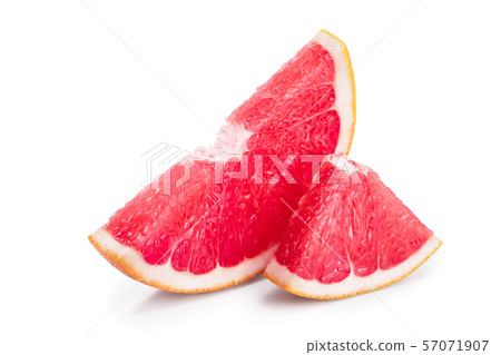 Grapefruit slice isolated on white background closeup Grapefruit slice isolated on white background closeup 57071907