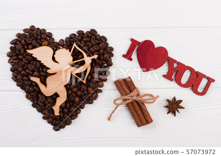 Romantic composition with coffee beans. 57073972