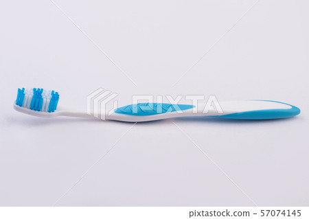 Plastic tooth brush on white background. Plastic tooth brush on white background. 57074145