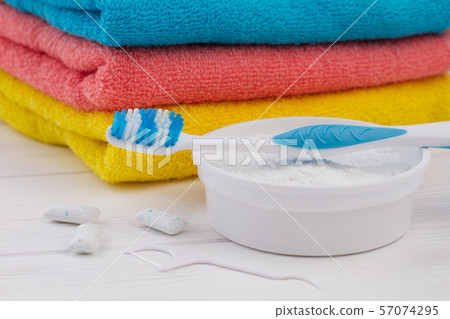 Toothbrush, cleaning powder, dental floss and towels. Toothbrush, cleaning powder, dental floss and towels. 57074295