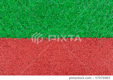 red rubber playground and artificial green grass 57078965