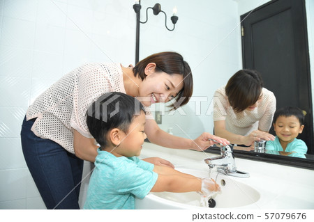 Hand washing with parent and child Hand washing with parent and child 57079676