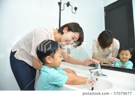 Hand washing with parent and child Hand washing with parent and child 57079677