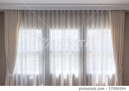 White curtain inside the window. Home interior White curtain inside the window. Home interior 57080894