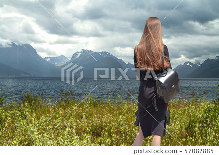 girl walks in the fjords. girl walks in the fjords. 57082885