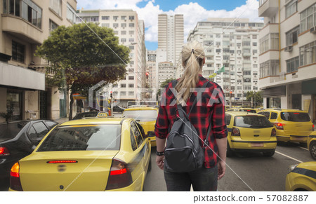 woman walks along Rio de Janeiro 57082887