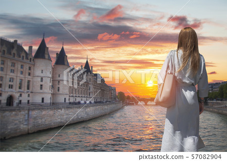 Woman in walks in the city of Paris Woman in walks in the city of Paris 57082904