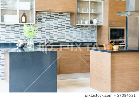 Modern, bright, clean kitchen interior with stainless steel appliances 57084551