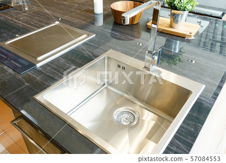 Stainless kitchen sink and Tap water in the kitchen 57084553