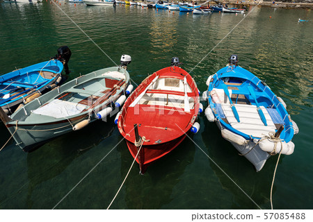 Small boats in Vernazza harbor - Cinque Terre Liguria Italy Small boats in Vernazza harbor - Cinque Terre Liguria Italy 57085488