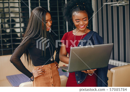 two business woman in a cafe two business woman in a cafe 57085784