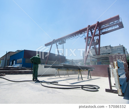 cleaning of the metal by sandblasting cleaning of the metal by sandblasting 57086332