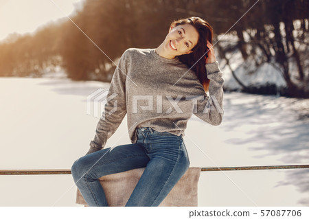Happy girl in a winter city 57087706