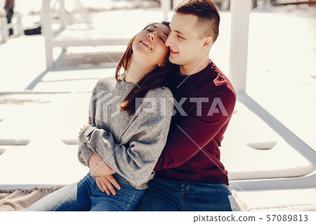 Couple in a winter park 57089813