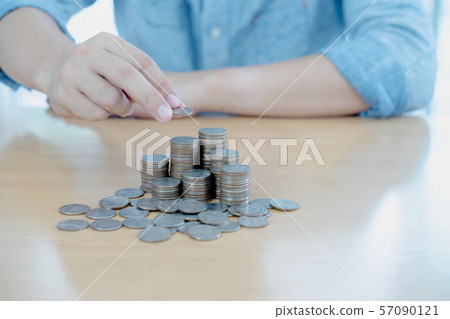 A Businessman Savings Counting Coins A Businessman Savings Counting Coins 57090121