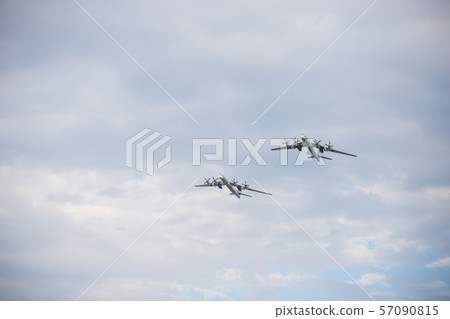 Two military long range bomber aircrafts flying in the sky Two military long range bomber aircrafts flying in the sky 57090815