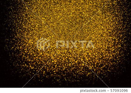 Abstract gold glister defocused on black background vignette use us gold luxury background for card 57091096