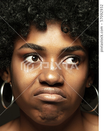 Close up portrait of young african-american emotional girl Close up portrait of young african-american emotional girl 57092932