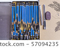 Many pencils used   in the pencils box on the 57094235