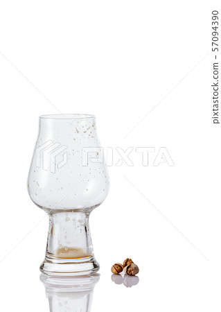 Empty Beer glass with drops Empty Beer glass with drops 57094390