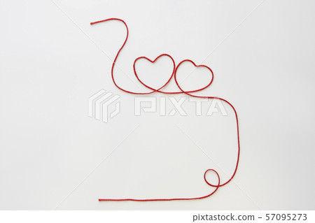 Red string heart 57095273