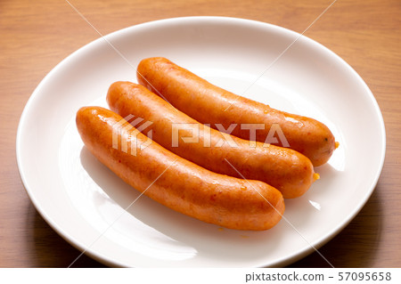 Three Wiener sausages (Chorizo). 57095658