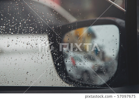 Drops Of Rain Drizzle on the glass windshield Drops Of Rain Drizzle on the glass windshield 57097675
