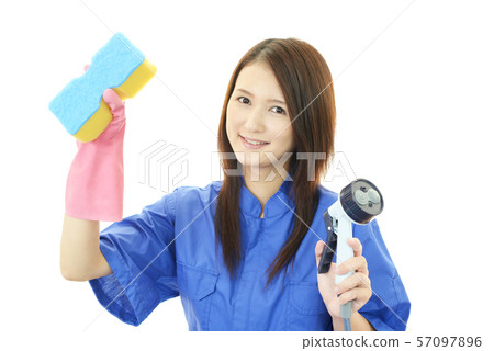 A smiling female worker A smiling female worker 57097896