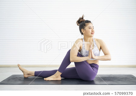 Young sport woman exercise with yoga at home. Good Young sport woman exercise with yoga at home. Good 57099370
