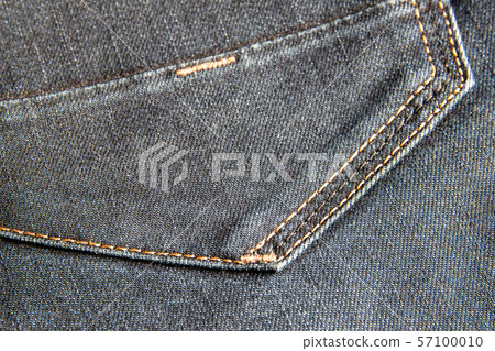 Denim texture closeup. back pocket on blue cotton Denim texture closeup. back pocket on blue cotton 57100010
