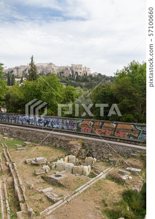 Metro train-line through Athens Ancient Agora with Acropolis in the background Metro train-line through Athens Ancient Agora with Acropolis in the background 57100660