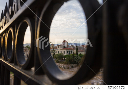 View through gate of Church behind Roman Agora in Athens, Greece 57100672