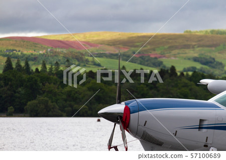 Hydroplane propeller and background lake view in Loch Lomond, Cameron Bay, Scotland Hydroplane propeller and background lake view in Loch Lomond, Cameron Bay, Scotland 57100689