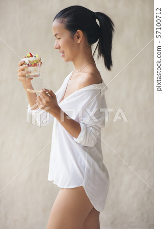 Healthy asia woman smile black hair white shirt Healthy asia woman smile black hair white shirt 57100712