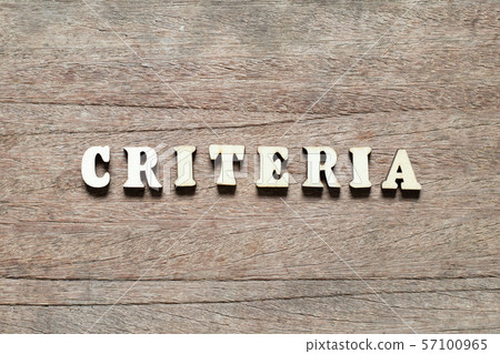 Letter block in word criteria on wood background 57100965