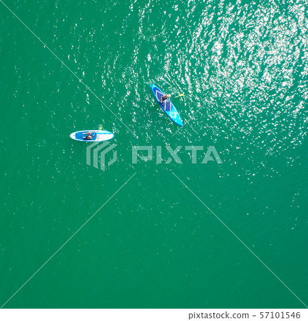Aerial view of sup boards on the sea. Top view of two paddleboard on a sunny day. View from above. Aerial view of sup boards on the sea. Top view of two paddleboard on a sunny day. View from above. 57101546