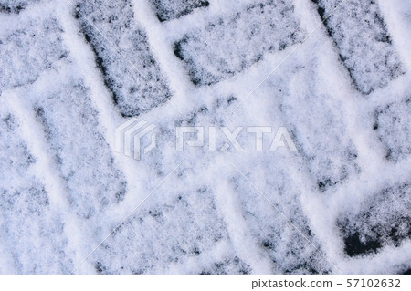 A little snow on the tiles 57102632